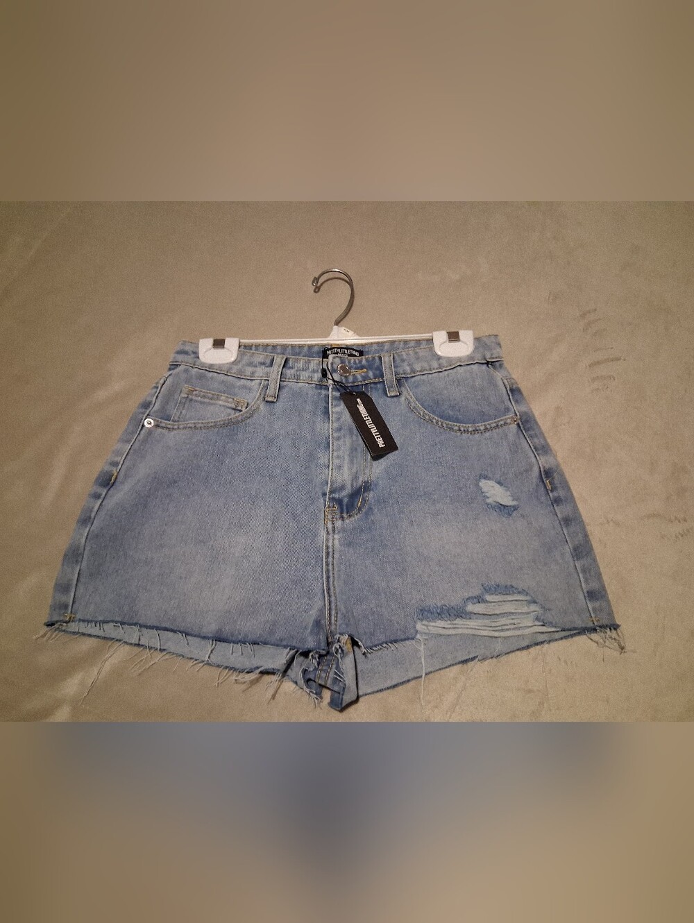 PRETTYLITTLETHING Light Blue Distressed Denim Women’s Shorts